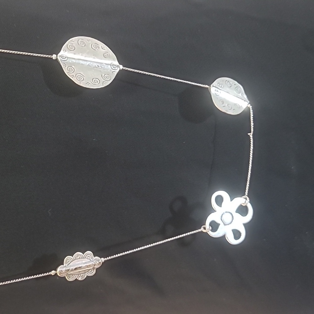 Silvertone long necklace floral hearts  spirals